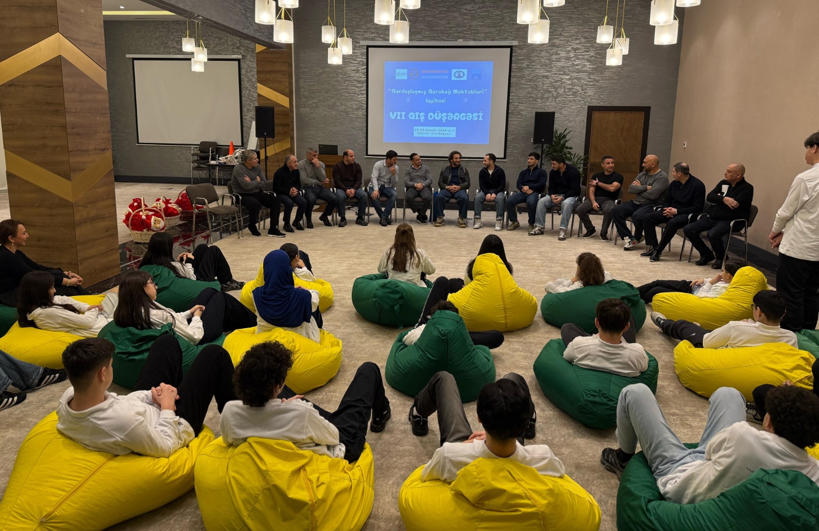 Olimpiya çempionları şəhid övladları ilə görüşüb