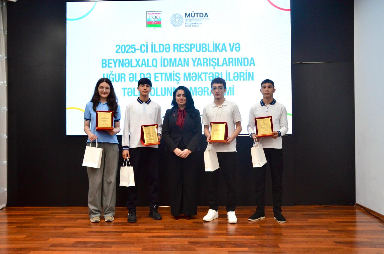 İdman sahəsində uğur qazanan məktəblilər Milli Olimpiya Komitəsində təltif olundu