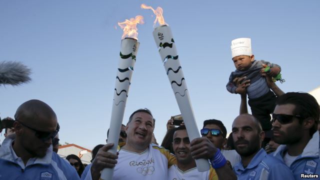 Olimpiya məşəlini suriyalı idmançı daşıyıb